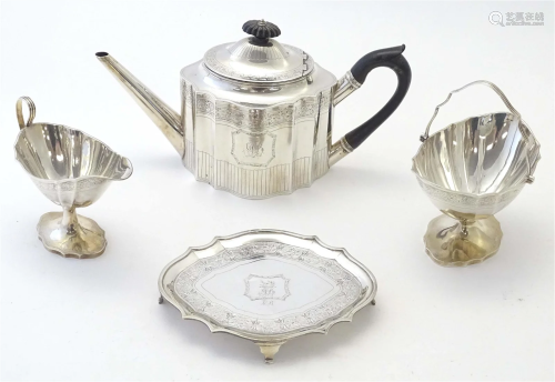 A George III Scottish silver three piece tea set comprising ...