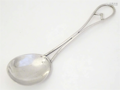 An Art Deco silver preserve / jam spoon with openwork handle...