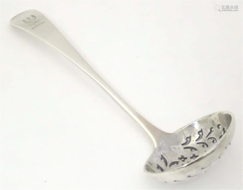A George III silver Old English pattern sifting spoon, hallm...