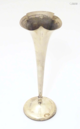 A silver bud vase of fluted form, hallmarked Birmingham 1900...