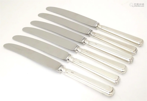 A set of six silver handled table knives, hallmarked Sheffie...