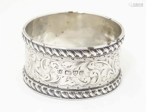 A silver napkin ring hallmarked Chester 1904 maker Colin Hew...