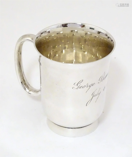 A silver christening mug, hallmarked London 1921 maker Rober...