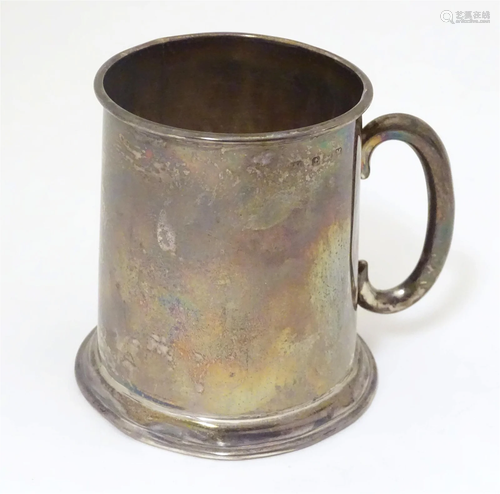 A silver Christening mug hallmarked Birmingham 1936. 3"...