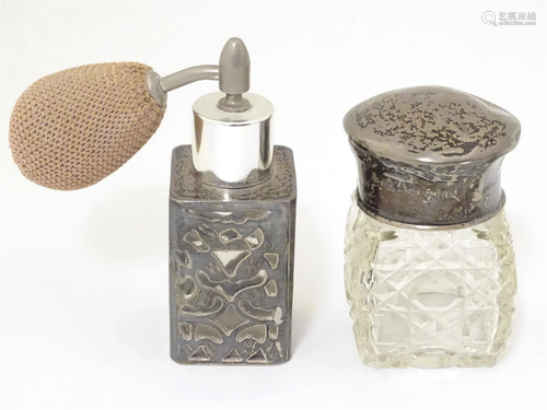 Two scent / perfume bottles, one with cut glass and silver t...