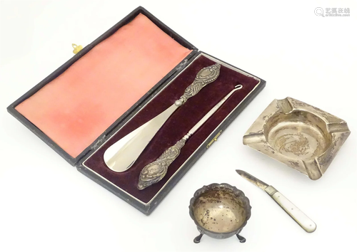 A silver handled buttonhook and shoe horn hallmarked Birming...