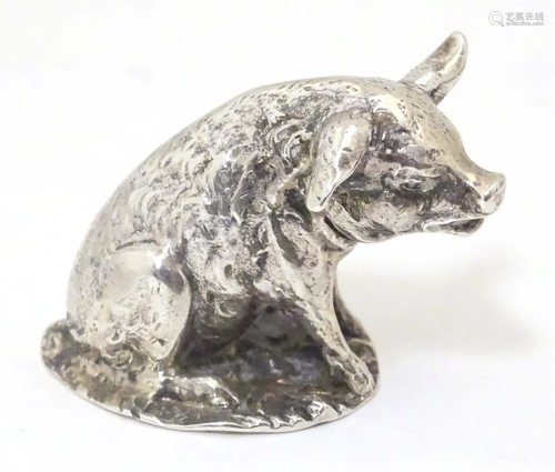 A 20thC silver model of a seated pig with importers marks fo...