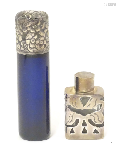 Scent / perfume bottles: A miniature scent bottle with silve...