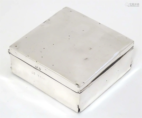 A silver table top cigarette box hallmarked Birmingham 1912 ...