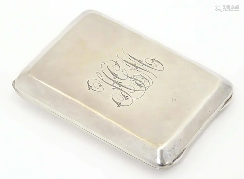 A silver matchbook cover/ holder with sprung lid. Hallmarked...