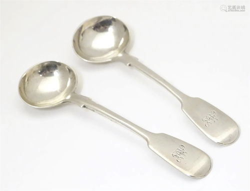 A pair of Victorian silver fiddle pattern salt spoons hallma...