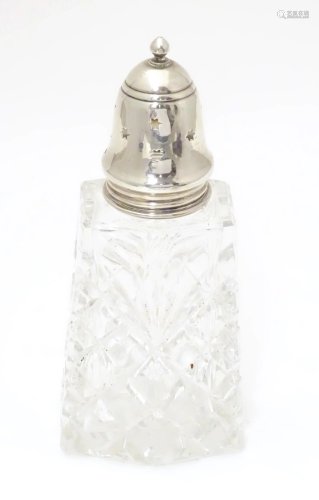 A cut glass sugar sifter / caster with silver top hallmarked...
