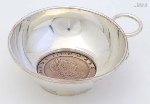 A silver plate quaich set with cartwheel style coin to base ...