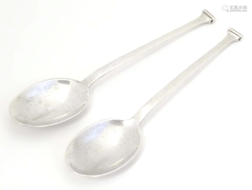 A pair of silver coffee spoons, hallmarked Sheffield 1933, m...