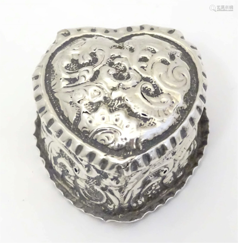 A Victorian silver pill box of heart shape hallmarked Birmin...