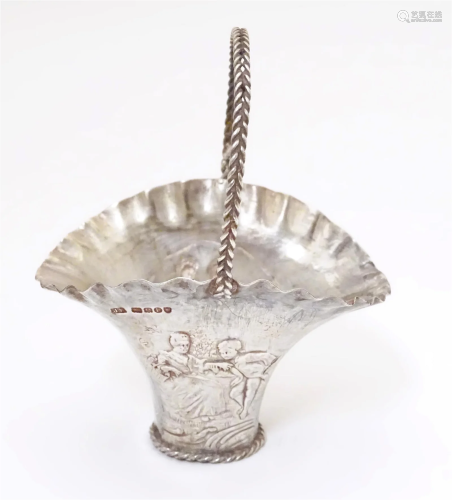 A miniature Dutch silver basket with import marks for London...