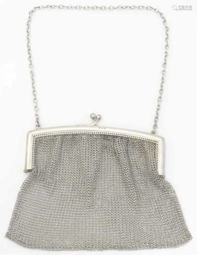 A purse / bag with chain mesh body. The silver top hallmarke...