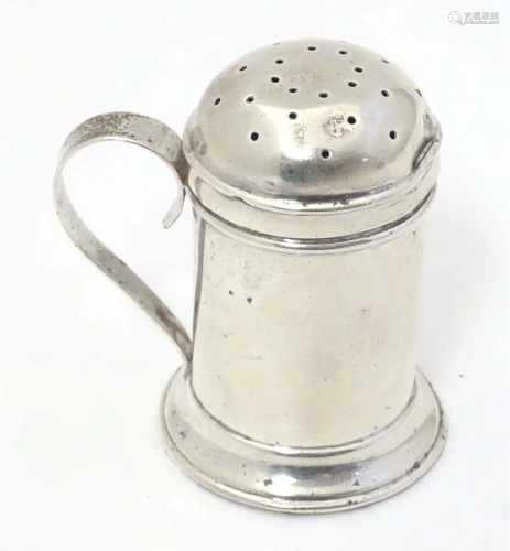 A silver pepper formed as a flour shaker with loop handle. H...