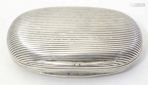 A German .800 white metal snuff box of ovoid form 2 1/4"...