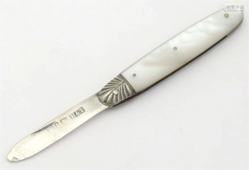 A silver folding fruit knife with mother of pearl handle. Ha...
