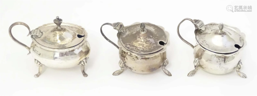 Three various silver mustard pots hallmarked Chester 1909/19...