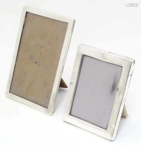 Two photograph frames with silver surrounds, one hallmarked ...