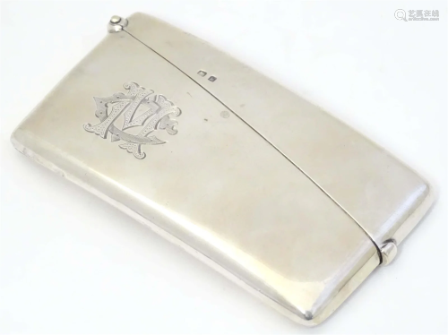 A silver card case hallmarked Birmingham 1909 maker George R...