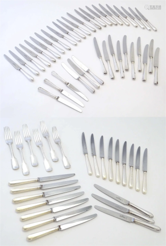 Assorted silver plated flatware to include various table kni...