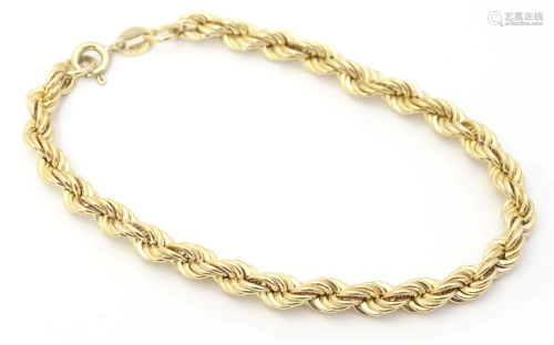 A 9ct gold bracelet with rope twist decoration. Approx. 7 1/...
