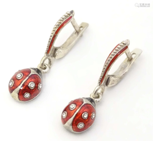 A pair of Russian silver drop earrings with enamel ladybird ...