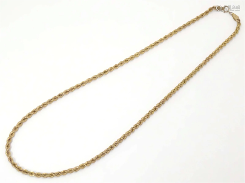 A 9kt gold necklace of rope twist form. Approx. 20" lon...