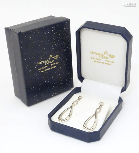A pair of .925 silver drop earrings, in a box marked Nichola...