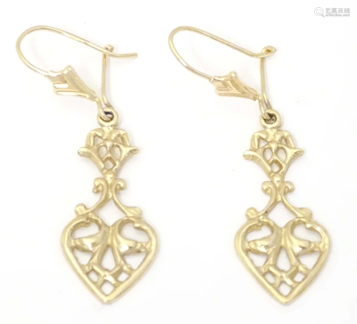 9ct gold drop earrings with openwork decoration. Approx 1 1/...