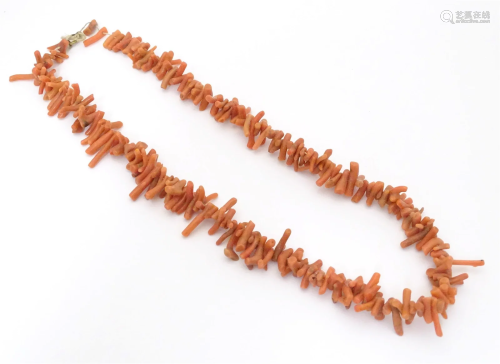 A vintage cork necklace of coal branch beads. approx. 6"...