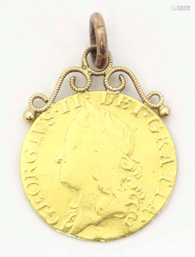 A George II 1752 gold coin with pendant hanger to top. Appro...