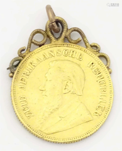 A South African 1893 gold coin with pendant loop to top. App...