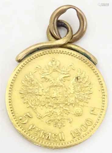 A Russian 1900 gold coin with pendant loop to top. Approx. 3...