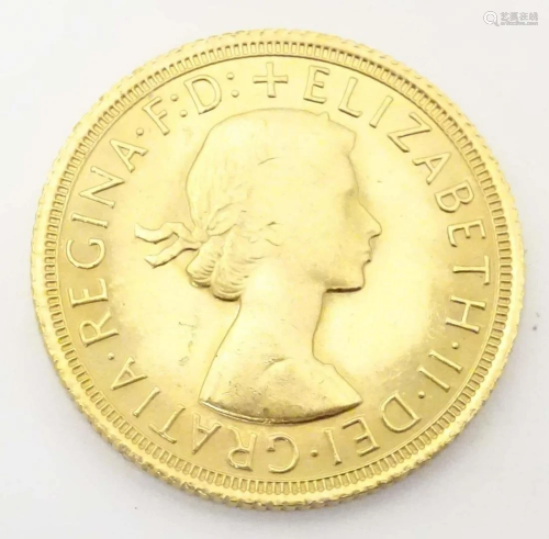 A Queen Elizabeth II 1968 gold sovereign coin. Approx. 7/8&q...