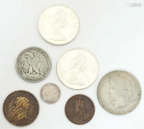 A quantity of assorted coins, to include a Unites States of ...