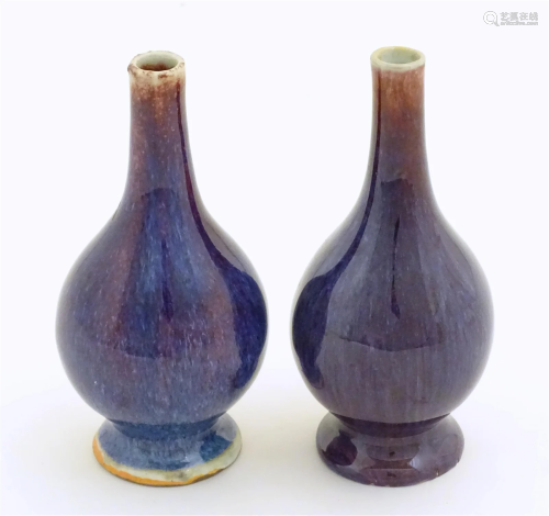 A pair of Oriental high fired bottle vases. Approx. 5 3/4&qu...