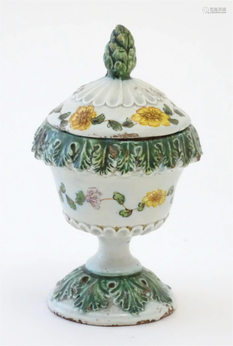 A Continental pedestal pot and cover with banded acanthus le...