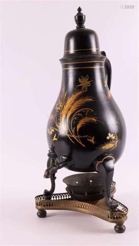 A black lacquered pear-shaped tap jug with ears of corn and ...