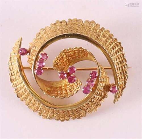 A 14 kt gold feather brooch, set with eleven rubies.