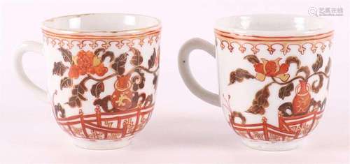 Two porcelain milk and blood 'rouge de fer' cups wit...