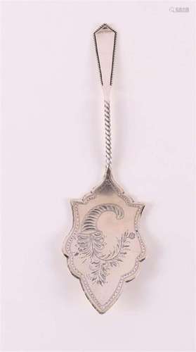 A second grade silver cake server, from 1897.