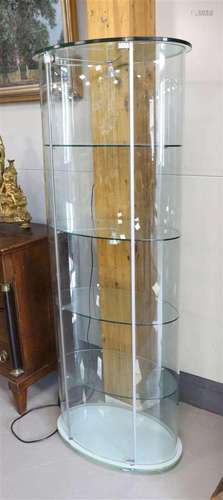 An oval glass one-door design display case, 21st century.