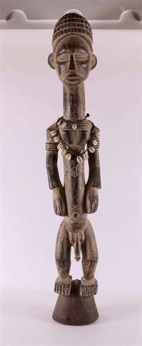 Ethnography. A wooden fertility statue of a man, Africa.