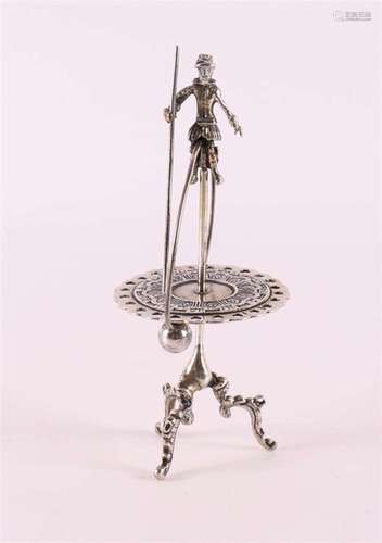 A 2nd grade silver miniature of a sundial.