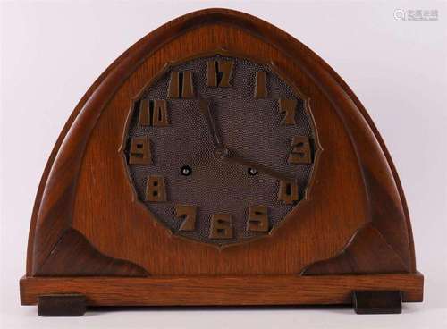 An Amsterdam school mantel clock in oak and rosewood case, c...