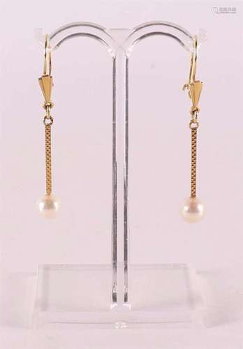 A pair of 14 kt gold Victorian earrings with faceted sapphir...